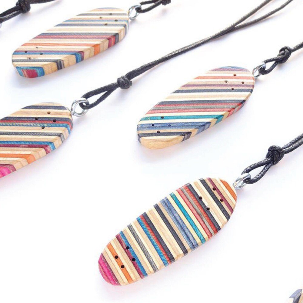 Skateboard cruiser pendant necklace made from recycleds skateboards