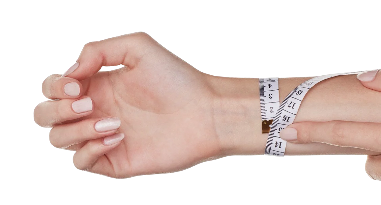 Een flexibel meetlint om de pols gewikkeld.